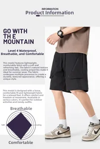 Dettaglio dei pantaloncini cargo da uomo con tessuto impermeabile e tasche con zip laterali