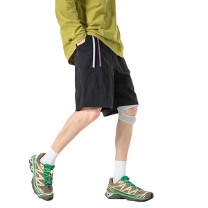 Men's Urban Outdoor quick-dry black shorts with side contrast stripes and loose fit cut