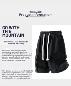 Détail du short cargo noir avec taille à cordon et grandes poches latérales à rabat