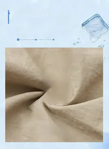 Macro shot of breathable khaki nylon fabric with cooling ice and water splash visual