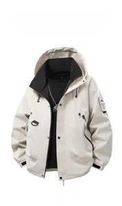 Detail of windproof high-collar hood and abrasion-resistant fabric on outdoor jacket