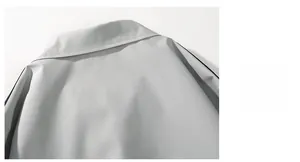 Close-up of the light gray jacket back featuring a sharp collar and premium woven fabric