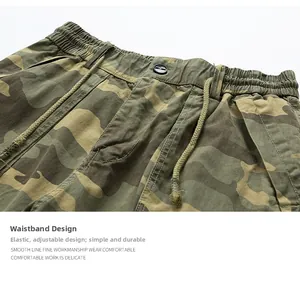 Detail of camouflage cargo shorts showing the elastic waistband with adjustable drawstring