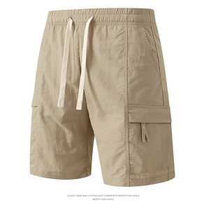 Detail view of khaki cargo shorts showing elastic drawstring waist and quick-dry fabric
