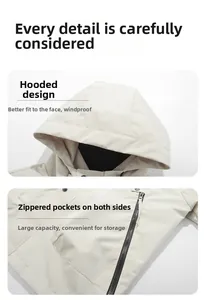 Detail view of outdoor jacket featuring a windproof hood and large zipper pockets