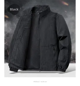 Detail view of black outdoor jacket with breathable mesh lining and stand-up collar
