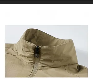 Macro detail of khaki stand-up collar jacket with high-quality matte metal zipper