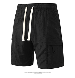 Detail of men's black cargo shorts featuring elastic waistband and contrast drawstrings
