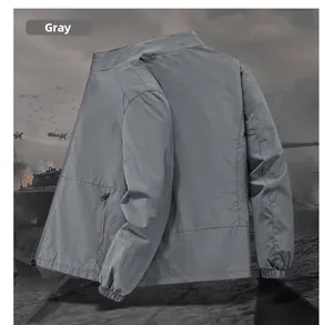 Detail of gray men's stand-up collar jacket featuring zipper pocket and elastic cuffs