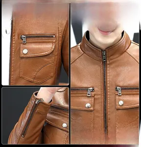 Detailed close-up showing double stitching and metal zippers on a brown biker jacket