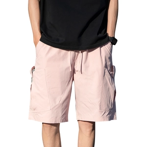 Men's light pink summer cargo shorts with drawstring waist and large flap side pockets