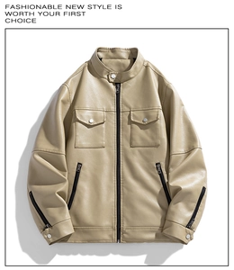 Detailed close-up of khaki faux leather jacket showing metallic zippers and stand collar