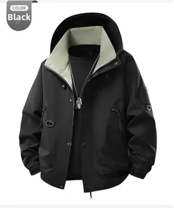 Detail of waterproof jacket featuring D-ring hook, dual closure, and velcro adjustable cuffs