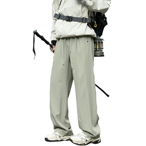 Men's light gray hiking pants with elastic drawstring waist for outdoor camping