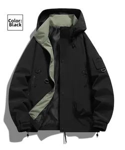 Detail view of black outdoor jacket with light green lining and adjustable hood