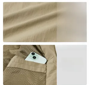 Detail of khaki jacket showing breathable mesh lining and secure inner phone pocket