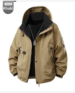 Detail view of water-resistant tan windbreaker with hood and ribbed black cuffs