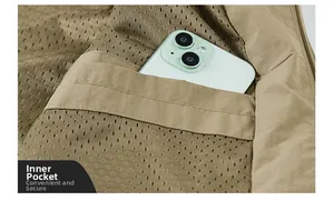 Detail of khaki jacket interior featuring a breathable mesh lining and a functional inner pocket