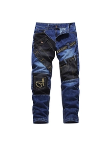 Schmale Herren-Jeans aus blauem Denim mit gelben Stickereien und Patchwork-Elementen