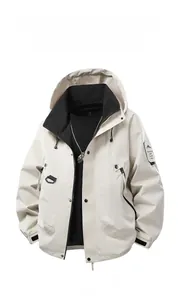 Detail of windproof outdoor hooded jacket in cream beige with functional zip cargo pockets