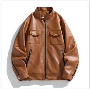 Detailed view of a brown faux leather jacket with stand collar and buttoned chest pockets