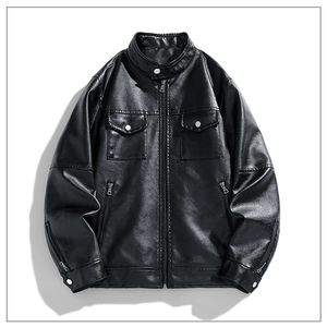Macro shot of black faux leather jacket detailing with stand collar and metal zipper pocket