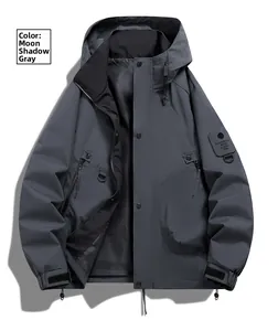 Detail of Moon Shadow Gray hooded jacket featuring a windproof zipper and velcro cuffs