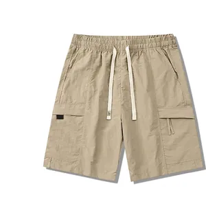 Men's khaki cargo shorts with drawstring waist and large pockets on white background