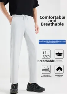 Close-up of lightweight, breathable ice silk fabric on light grey men's casual trousers