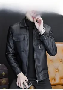 Detail of lapel collar and metal zipper pocket on black leather biker jacket