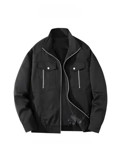 Detailed view of black military-style bomber jacket featuring flap chest pockets and stand collar