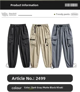Detail view of multi-color cargo pants showing adjustable drawstring cuffs and functional pockets
