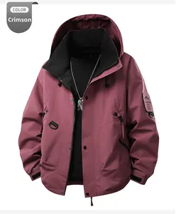 Detail of the rouge red outdoor hooded jacket with adjustable velcro cuffs and mountain patch