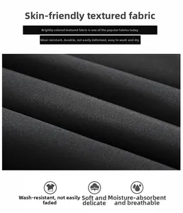 Macro detail of breathable black synthetic fabric showing fine texture and skin-friendly weave