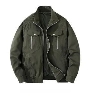 Detailed view of olive green workwear jacket with stand collar and functional utility pockets