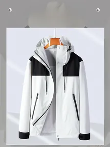 Detail of hooded windproof jacket featuring breathable mesh lining and zipper closure