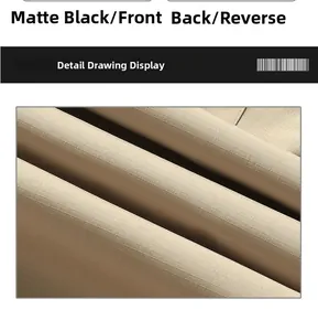 Close-up of durable ripstop fabric texture for cargo pants in matte black finish