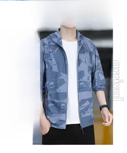 Detailed close-up of hooded sun protection jacket featuring blue floral camo print