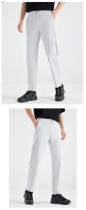 Detail view of light grey quick-dry sports trousers featuring side zipper pockets