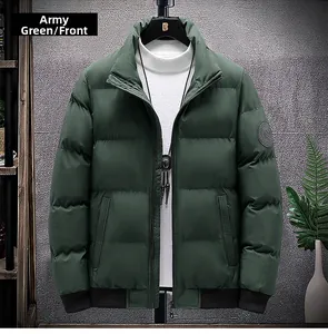 Detail of army green puffer jacket showing stand collar, zipper, and ribbed cuffs