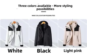 Three functional hooded outdoor jackets in white, black and pink with contrast sleeves