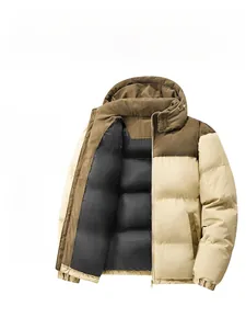 Close-up of winter hooded jacket featuring corduroy patchwork and a warm padded lining
