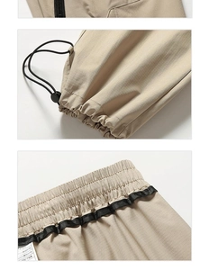 Detailed views of khaki ripstop fabric with zipper pockets and adjustable drawstring hem