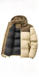 Detail of hooded men jacket with brown corduroy shoulders and beige quilted fabric