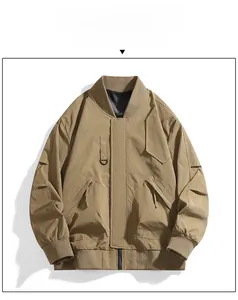Detailed flat lay of a khaki American style pilot bomber jacket with ribbed cuffs and D-ring