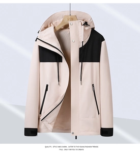 Detail of light pink waterproof jacket showing mesh lining and adjustable drawstring hood