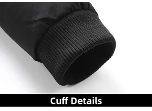 Close-up of windproof ribbed knitted cuffs on a thick black winter padded jacket