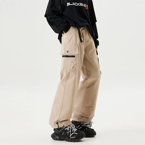 Khaki cargo pants for men with flap pockets and adjustable drawstring hem in a loose fit