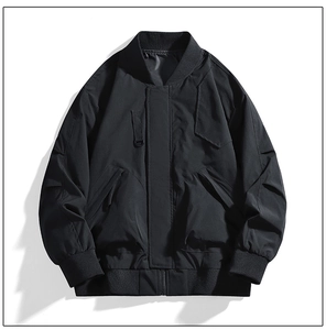 Detail view of black bomber jacket featuring ribbed collar and windproof front flap fabric