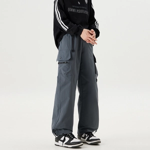Men's grey-blue cargo pants with flap pockets and adjustable drawstring leg openings